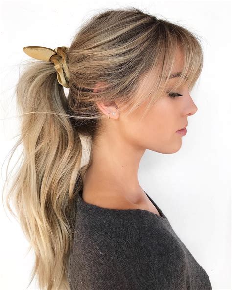 fringe ponytail hairstyle|relaxed hair bangs with ponytail.